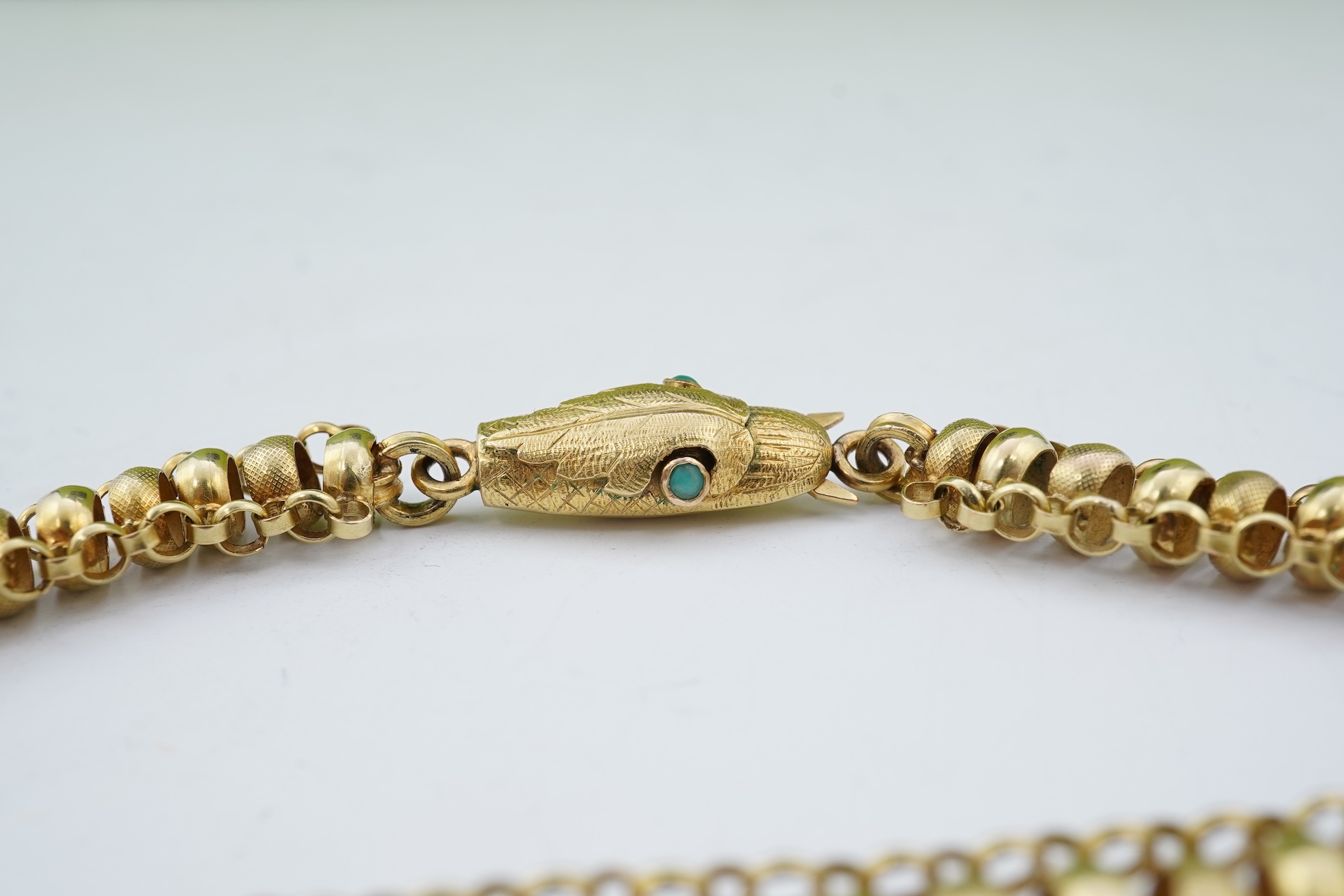 A gold long guard chain, 19th century